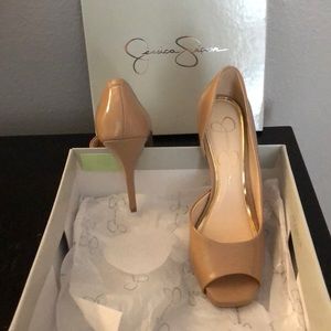 NEVER WORN- Nude Patent Leather Peek-a-boo pumps.